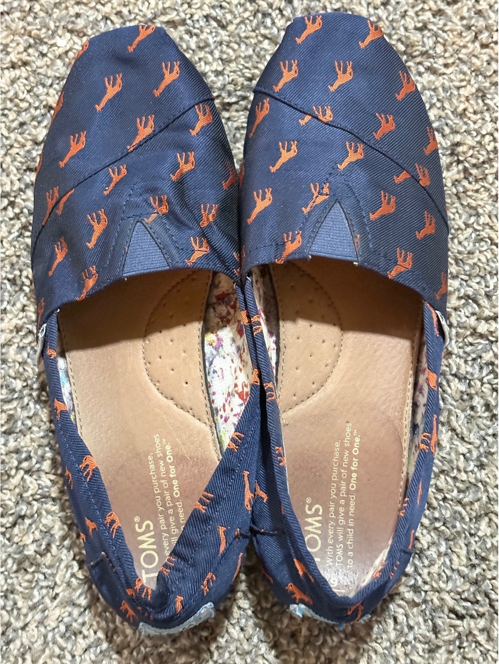 TOMS Classic Navy Blue Slip-On Shoes with Orange Giraffe Print, Size W9